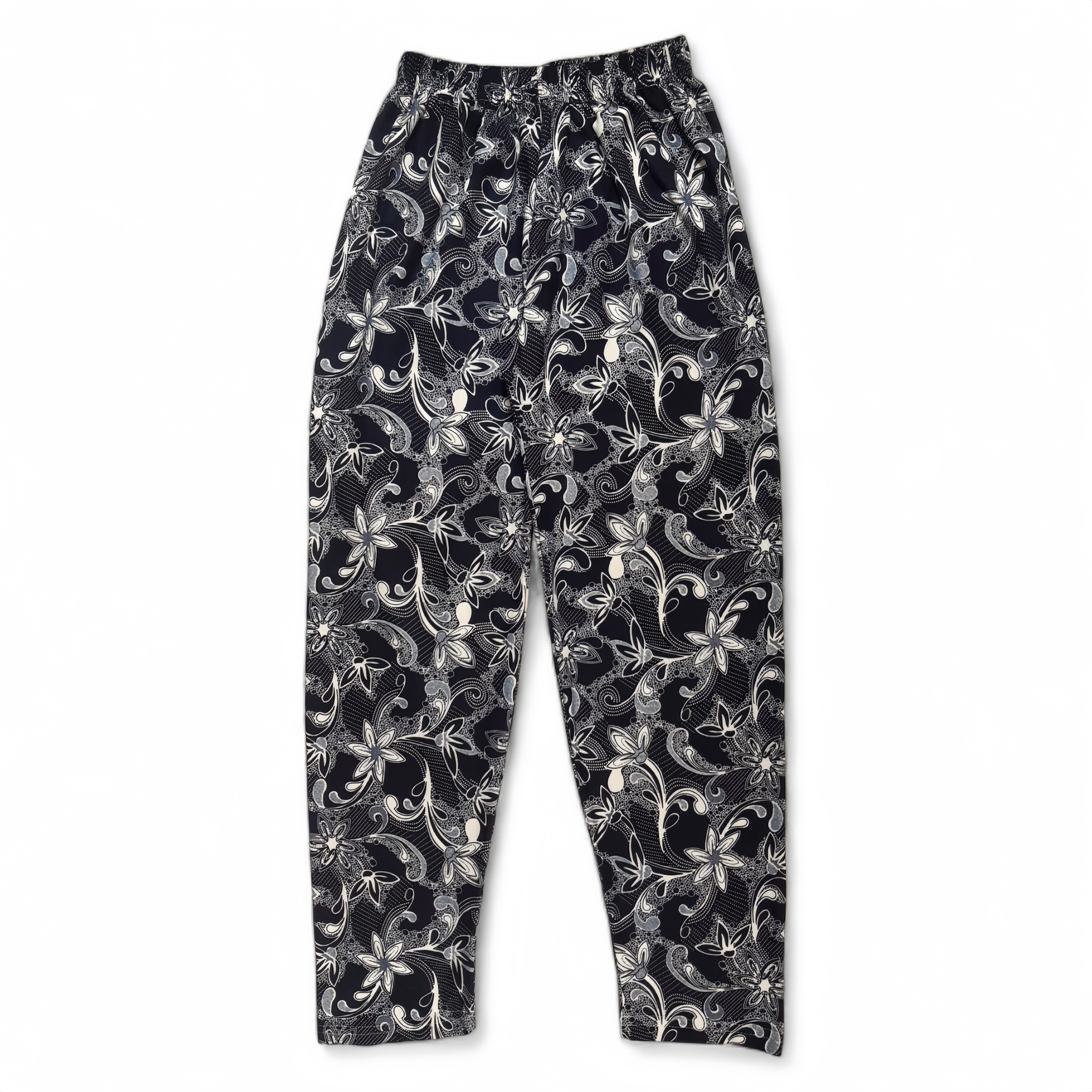 شلوار زنانه گل سفید روی زمینه سورمهای