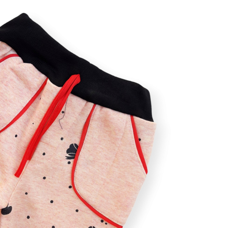 شلوار اسلش نارنجی دخترانه با طرح پاپیون کودکانه