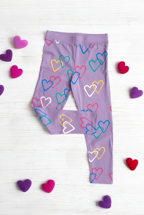 شلوار اسلیم فیت کودکانه با طراحی فانتزی قلبی